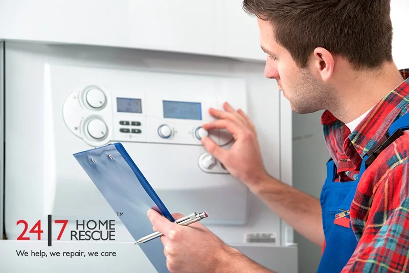Engineer standing near a boiler