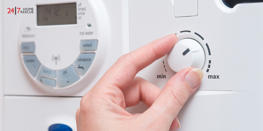 Close-up of user controlling boiler pressure settings
