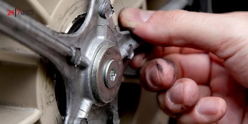 Front-load Washing Machine Drive Wheel Test with Repairman's Hand