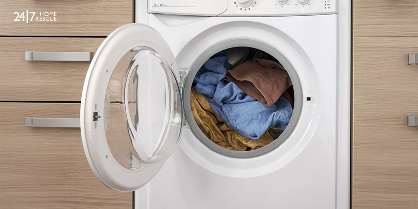Close-up of a built-in washing machine in a home kitchen