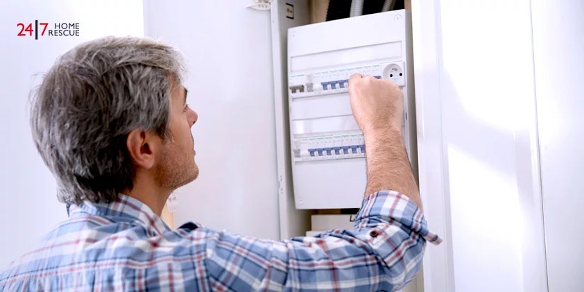 A Person Looking To Repair a Tripping Fuse Box
