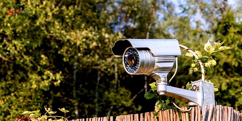 CCTV security camera on the garden fence