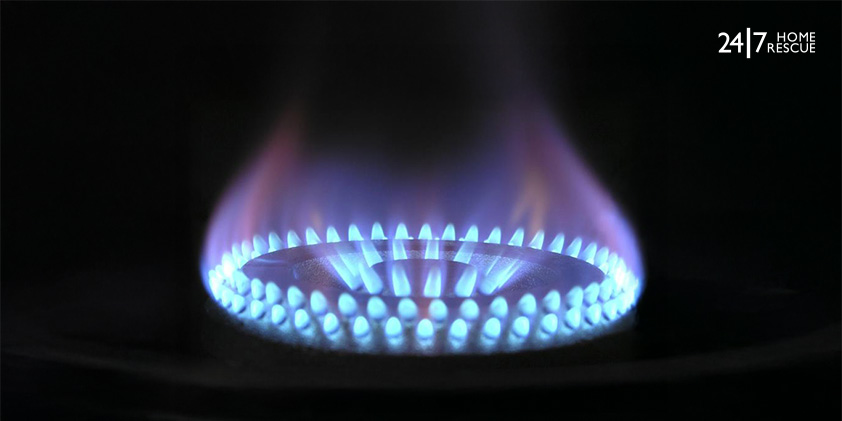 Blue flame on gas burner during a gas safety check