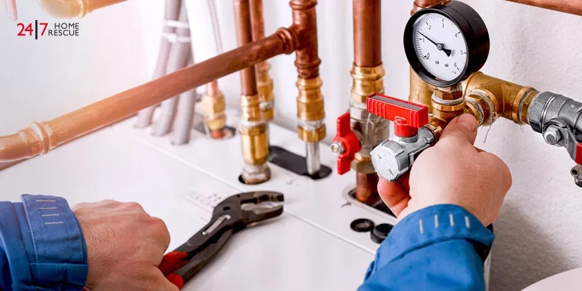 An Engineer is Inspecting the Boiler Gas Valve.