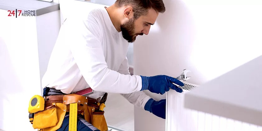 Worker is adjusting the lock shield valve