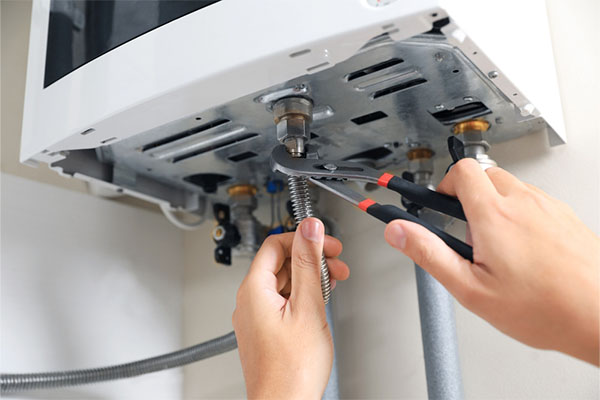 An engineer is doing boiler inspection checks