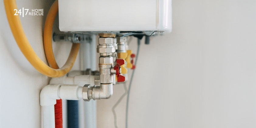Close-up of colorful pipes and valves on a boiler