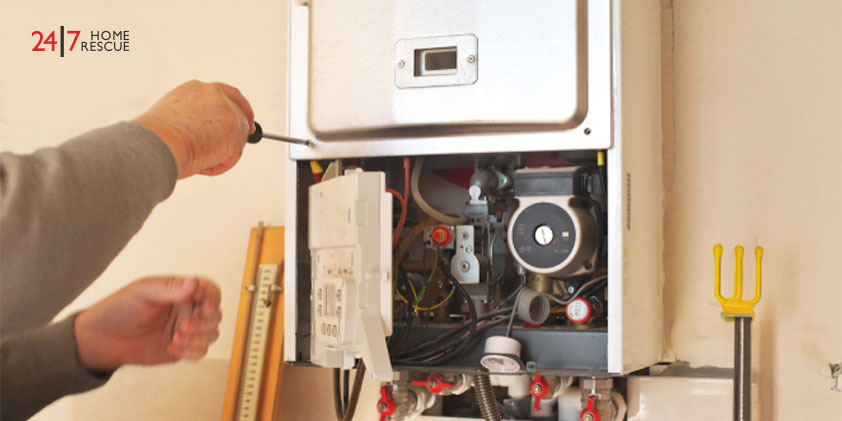 engineer repairing boiler for the ignition failure fault