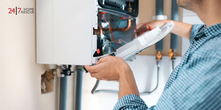 Man opening top of gas boiler