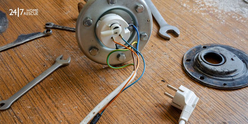 Engineer repairing a gas boiler for PCB fault