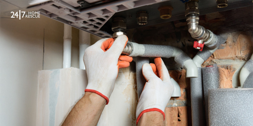 Frozen condensate pipe on wall-mounted gas boiler causing blockage and shutdown