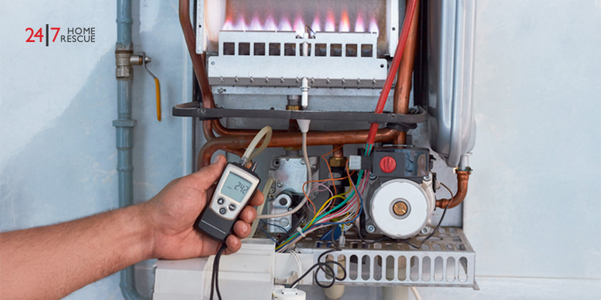 Gas boiler with low pressure gauge as person reading and diagnosing gas supply or pressure problems