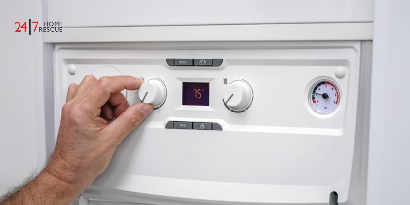 A man managing boiler warmth