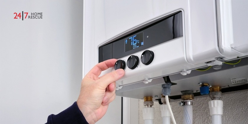 A man regulating heating in a combi boiler