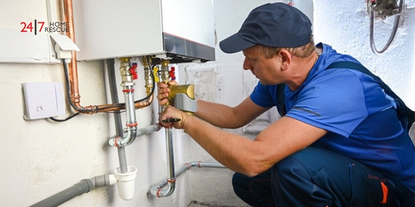Engineer repairing a diverter valve