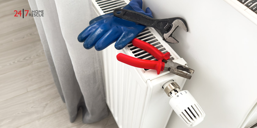 Repair tools and a gas boiler radiator