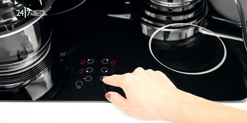 Touch control panel on an induction hob to unlock the cooktop