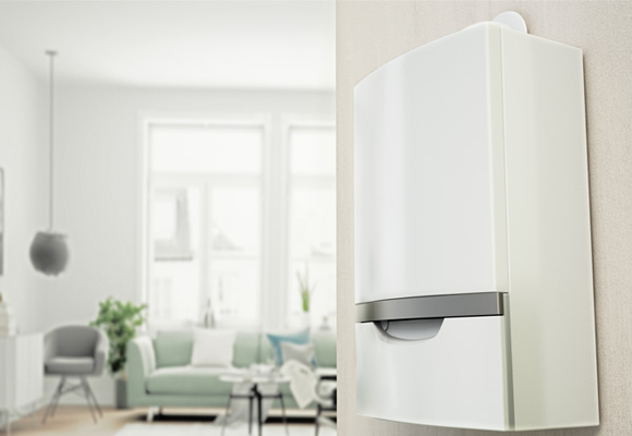 Modern white wall-mounted boiler in a Birmingham home